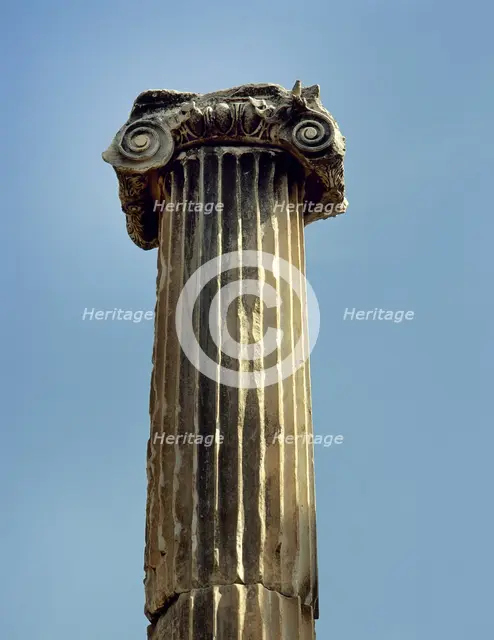Ionic order, capital with voluta and column, Pergamon, Aeolis, Turkey, 1999.  Creator: Unknown.