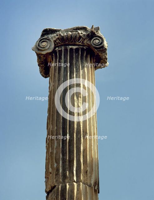 Ionic order, capital with voluta and column, Pergamon, Aeolis, Turkey, 1999.  Creator: Unknown.