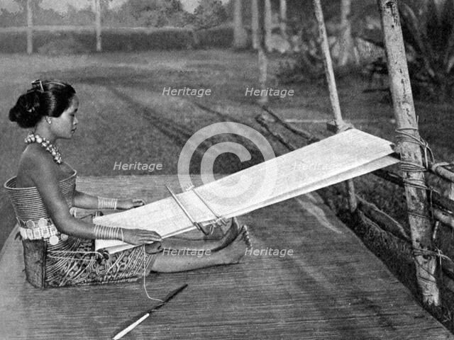 Iban weaver, Borneo, 1922. Artist: Dr Charles Hose