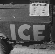 Ice truck with ceiling prices listed on the side, Daytona Beach, Florida, 1943. Creator: Gordon Parks