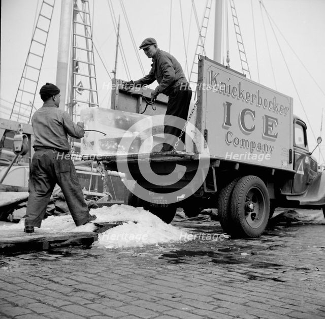 Ice used to store fish in ships, New York, 1943. Creator: Gordon Parks.