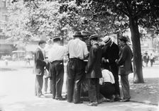 Ice water in the park--hot day, N.Y.C., between c1910 and c1915. Creator: Bain News Service