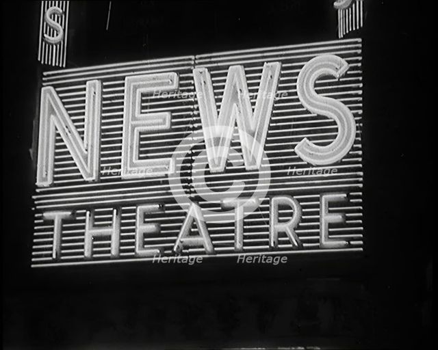 Illuminated Sign. Sign Reads: 'News Theatre', 1931. Creator: British Pathe Ltd.