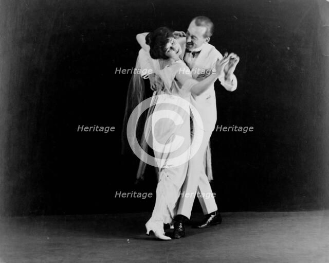 Irene and Vernon Castle, full-length, in dancing position, between 1910 and 1918. Creator: Frances Benjamin Johnston.