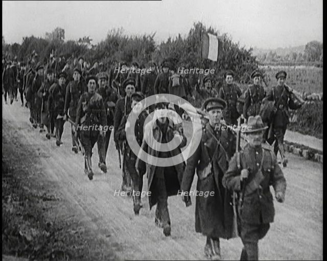 Irish Free State Soldiers Marching Along a Road, 1922. Creator: British Pathe Ltd.