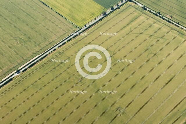 Iron Age/Roman settlement in Comberton, Cambridgeshire, 2015. Artist: Damian Grady.