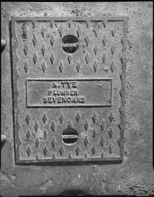Iron drain cover in the cellar, Broughton House, London Road, Dunton Green, Kent, 1990. Artist: Peter Williams