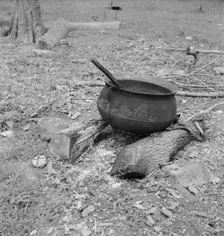 Iron pot for heating...in the yard of Negro tobacco farmer, Person County, North Carolina, 1939. Creator: Dorothea Lange