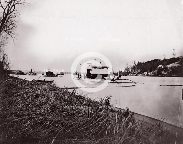 Ironclad fleet on James River below Rebel "Howlett House Battery", 1865. Creator: Unknown.