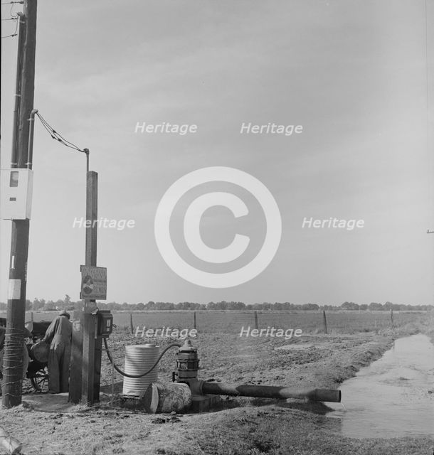 Irrigation pump on edge of field, San Joaquin Valley, California, 1938. Creator: Dorothea Lange.