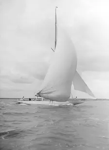 Istria sailing downwind under spinnaker, 1912. Creator: Kirk & Sons of Cowes
