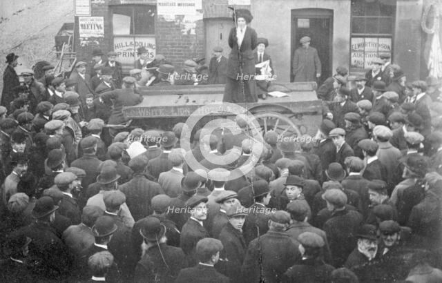 Isabel Seymour addressing a crowd of men and boys from a tradesman's cart, 1908. Artist: Unknown