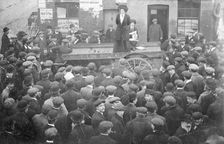 Isabel Seymour addressing a crowd of men and boys from a tradesman's cart, 1908