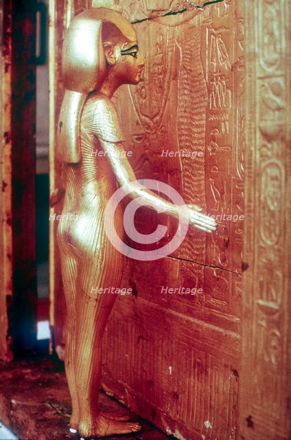 Isis the protective goddess guarding the Canopic Shrine, Tomb of Tutankhamun, Cairo. Artist: Unknown