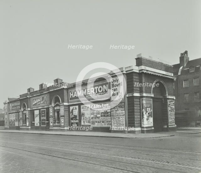 Islington Tramways Sub-Station and advertisements, London, 1936. Artist: Unknown.