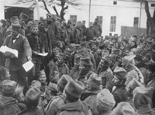 Issuing passes for a few days leave at home to the wounded Serbian troops at Nish 1915