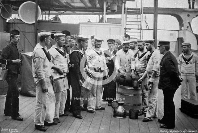 Issuing rum on board HMS 'Royal Sovereign', 1896. Artist: W Gregory