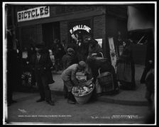 Italian bread peddlers, Mulberry St., New York, c1900. Creator: Byron Company