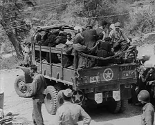 Italian Civilians Being Driven off in a US Army Truck, 1943-1944. Creator: British Pathe Ltd