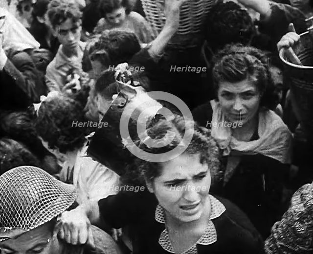 Italian Civilians Gathering Water in Naples, 1943-1944. Creator: British Pathe Ltd.