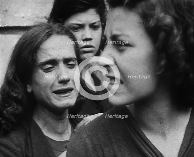 Italian Civilians Jostling in a Queue for Food, 1943-1944. Creator: British Pathe Ltd.