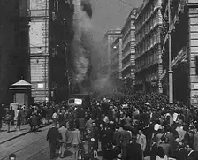 Italian Civilians Moving Slowly Through Bomb-Damaged Naples, 1943-1944. Creator: British Pathe Ltd