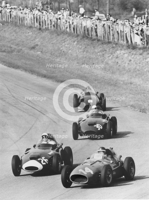 Italian Grand Prix 1958, Moss in Vanwall leads Hawthorn's Ferrari. Creator: Unknown.