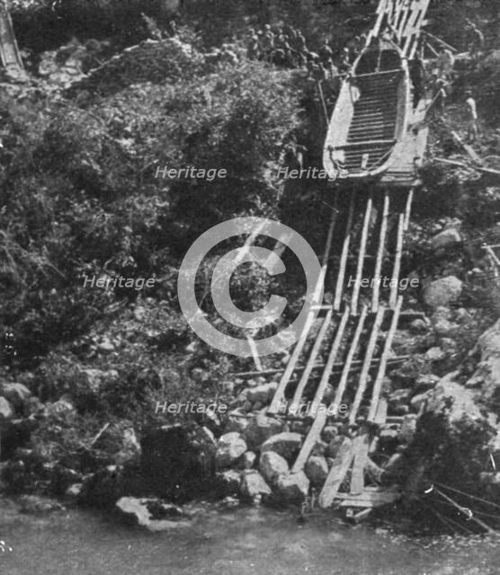 Italian Offensive of the Isonzo; Boats are lowered on a slide of the riverbank escarpment, 1917. Creator: Unknown.