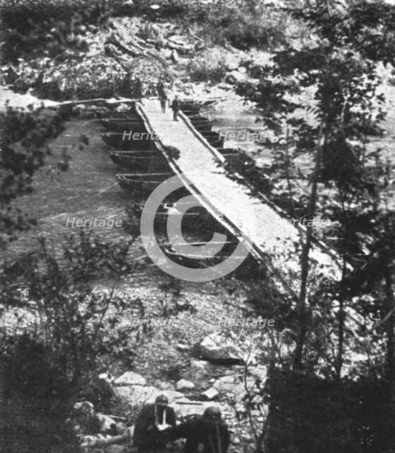 Italian Offensive of the Isonzo; Decking is laid over the boats, 1917. Creator: Unknown.