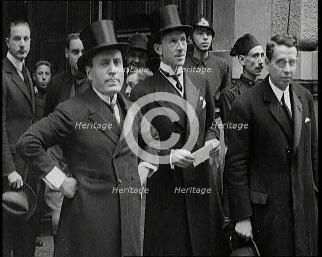 Italian Prime Minister Benito Mussolini Standing With Other Italian Politicians, 1922. Creator: British Pathe Ltd.