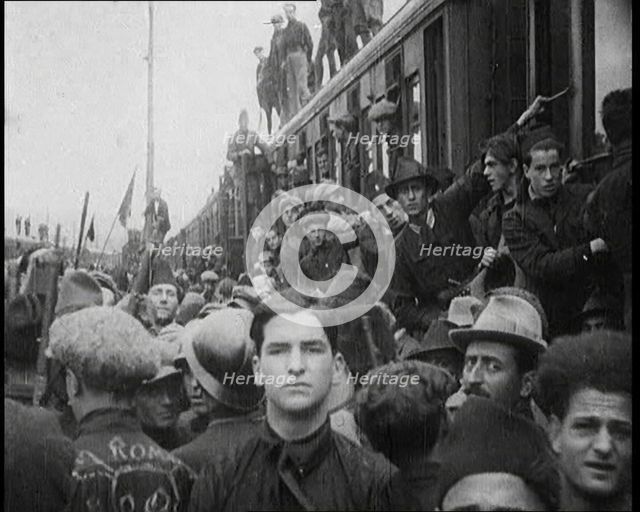Italian Soldiers Standing on or Near a Train, 1922. Creator: British Pathe Ltd.