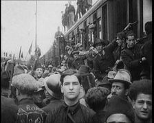 Italian Soldiers Standing on or Near a Train, 1922. Creator: British Pathe Ltd