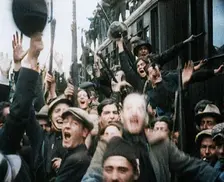 Italian Soldiers Standing on or Near a Train, Waving and Cheering, 1922. Creator: British Pathe Ltd