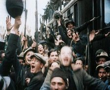 Italian Soldiers Standing on or Near a Train, Waving and Cheering, 1922. Creator: British Pathe Ltd