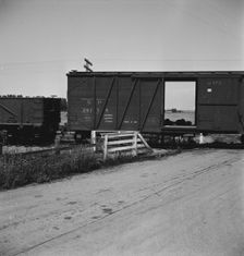 Itinerant laborers riding the freight, West side of San Joaquin Valley, California, 1938. Creator: Dorothea Lange