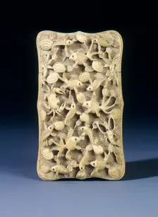 Ivory card case with crabs and fish in high relief, Hong Kong, 1936. Creator: Unknown