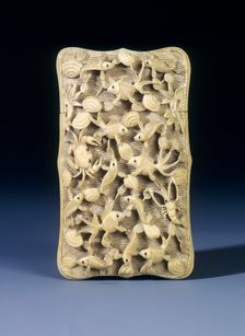 Ivory card case with crabs and fish in high relief, Hong Kong, 1936. Creator: Unknown
