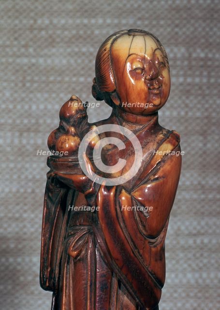 Ivory Chinese figurine of an attendent to Hsi Wang Mu, 17th century. Artist: Unknown