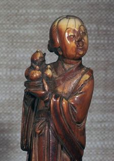 Ivory Chinese figurine of an attendent to Hsi Wang Mu, 17th century
