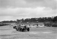 J Cleland's Ford V8 and JH Barker's Riley Lynx at the chicane, JCC Members Day, Brooklands, 1939. Artist: Bill Brunell