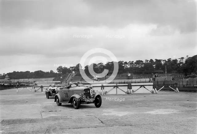 J Cleland's Ford V8 and JH Barker's Riley Lynx at the chicane, JCC Members Day, Brooklands, 1939. Artist: Bill Brunell.