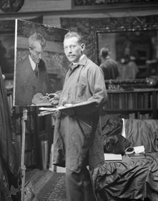 J.M. Williamson painting a portrait of Arnold Genthe, 1915. Creator: Arnold Genthe