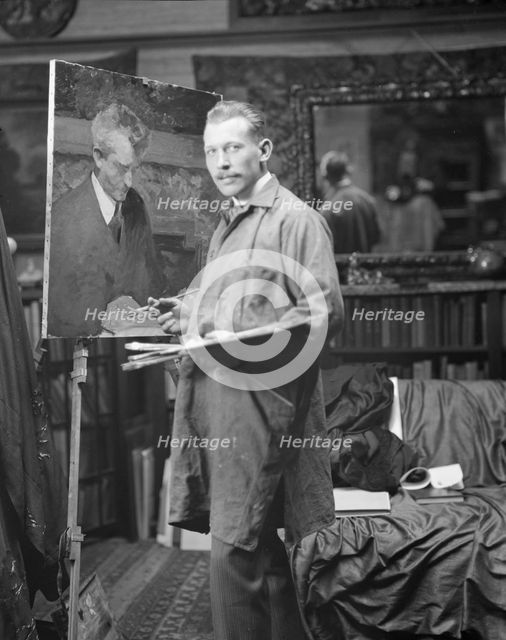 J.M. Williamson painting a portrait of Arnold Genthe, 1915. Creator: Arnold Genthe.