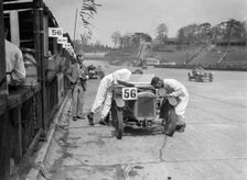 J Reeves and HHB Beacon's Austin Ulster at the JCC Double Twelve race, Brooklands, 8/9 May 1931. Artist: Bill Brunell