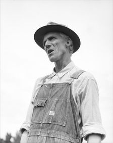 J.M. Rees tells his story of violence in Arkansas, Hill House, Mississippi, 1936. Creator: Dorothea Lange