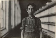 Jo Bodeon, a \back-roper\ in mule room. Chase Cotton Mill, Burlington, Vermont, 1909. Creator: Lewis Wickes Hine