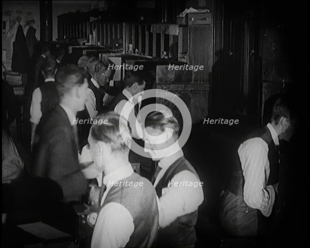 Journalists at Work in a Busy Newspaper Office, 1921. Creator: British Pathe Ltd.