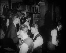 Journalists at Work in a Busy Newspaper Office, 1921. Creator: British Pathe Ltd