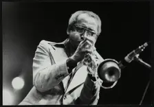 Joe Newman playing his trumpet, Beaulieu, Hampshire, July 1977. Creator: Denis Williams
