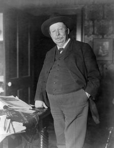 Joel Chandler Harris, three-quarter-length portrait, standing, facing slightly left, c1890 and 1910. Creator: Frances Benjamin Johnston
